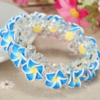 Bracelets de perles de cristal de fleur de frangipanier en argile douce classique faits à la main bijoux à la mode pour les vacances à la plage accessoire en gros