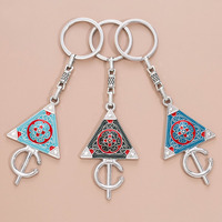 Pendentifs marocains avec motifs triangulaires et circulaires, accessoires décoratifs, souvenirs touristiques, porte-clés culturels