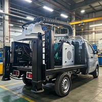 Petite plateforme de forage de puits d'eau montée sur camion et capable de rouler, pour des forages de puits d'eau jusqu'à 200 m