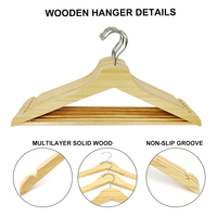 Cintre en bois rond à un seul niveau de qualité supérieure en gros personnalisé avec encoche antidérapante pour les magasins et les salons de vêtements