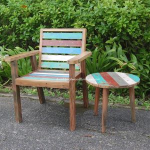 Le fauteuil Gardenia en bois de bateau recyclé présente une couleur naturelle et un dossier robuste, idéal pour un jardin ou une terrasse. - Product Image 2