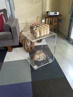 Table basse en acrylique transparente de luxe moderne sur mesure pour salon, avec roulettes, en carton, pour grossistes