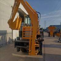 Chargeuse-pelleteuse avec godet pour travaux d'ingénierie municipale et de terrassement de fondations