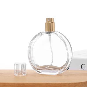 Flacon pulvérisateur de parfum en <span class=keywords><strong>verre</strong></span> rond de haute qualité, rechargeable, pour cosmétiques et soins de la peau, 30 ml, 50 ml, 100 ml, avec bouchon - Product Image 2