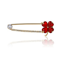 Broche en métal plaqué or et argent, motif trèfle à quatre feuilles entièrement orné de strass, épingle de sûreté pour la vente en gros de bijoux - Nouvelle tendance porte-bonheur