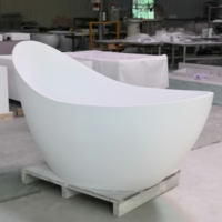 Baignoire autoportante ovale haut de gamme de luxe écologique en pierre artificielle à surface mate noire pour hôtel contemporain