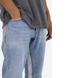 Jean en denim bleu pour homme, coupe slim évasée, avec patchwork contrastant, déchiré et effet empilé - Product Image 5