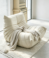 Canapé-lit modulaire sans accoudoirs en fauteuil lounge moderne, coloris blanc crème, avec revêtement en polaire sherpa, pour salon et appartement