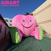 Mascotte gonflable en peluche rose en forme de cœur pour le thème de l'événement