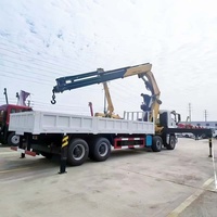 Grue montée sur camion Isuzu 8x4, moteur XC MG, 28 tonnes, flèche pliante à 8 sections, transmission manuelle rapide à 12 vitesses, haute capacité de charge