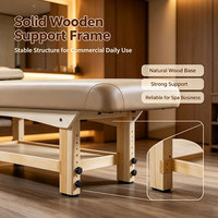 Lit de massage thaïlandais à structure en bois massif le plus vendu Portable et entièrement réglable pour une utilisation dans la chambre Lit de spa de salon au design moderne