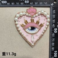 2025 nouveau Design perlé Appliques coeur yeux mauvais yeux à la main perlé perle cristal verre brodé patchs pour vêtements