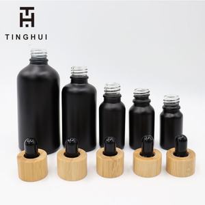 30ml 60ml 100ml 1 oz Black Matte <b>Dropper</b> <b>Bottles</b> 30g 50g 100g Black Matte Frosted Glass Jar with Faux Bamboo Top - Product Image 5