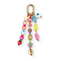 Breloque de sac en perles de verre peintes à la main colorées, coquillage vintage, conque, œil porte-bonheur, cœur, fleur, porte-clés perlé, décoration rétro pour sac et pochette