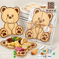 Planche à découper en bambou naturel en forme d'ours avec ensemble de couverts, idéale pour les fêtes de naissance et la présentation de collations pour enfants à la maison
