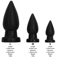 Plug anal en silicone noir surdimensionné avec ventouse, pointe pointue, design épais de la taille d'un poing pour l'entrée postérieure, jouet sexuel