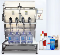 Dispositif de remplissage semi-automatique à quatre têtes pour liquides, structure haute efficacité pour ligne de conditionnement d'eau minérale et de boissons gazeuses