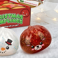 Boîte mystère de Noël : Squishy boule anti-stress scintillante en forme de boulette pour les fêtes et les cadeaux