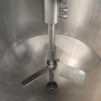 Machine de remplissage de pâte liquide à haute viscosité Lipsalve, baume à lèvres, acier inoxydable 304, trémie de mélange chauffante, semi-automatique, pneumatique