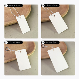 Étiquette suspendue rectangulaire en papier blanc Meng Hao avec logo personnalisé estampé pour vêtements et chaussures en gros - Product Image 4