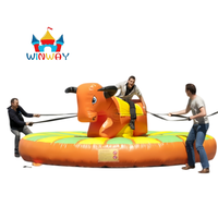 Taureau mécanique gonflable avec tapis de sécurité, aire de jeux de carnaval commerciale pour la location de fêtes et les divertissements en plein air