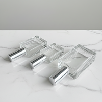 Flacons de parfum de luxe personnalisables en verre carré, capacité de 50 ml, design rechargeable avec bouchon compte-gouttes et givrage sérigraphié