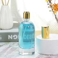 Bouchon de rouleau de bouteille de parfum en verre nouveauté de luxe personnalisé 50ml 100ml emballage épais transparent couvercle de cylindre forme carrée boîte en liège