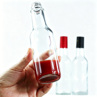 Bouteille Woozy en verre silex sans plomb de 150 ml (5 oz) pour épices, sauces, sauces chili, sauces salade, sauces BBQ, sauces piquantes, avec couvercle noir anti-fuite