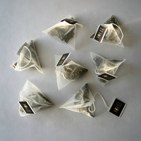 Machine d'emballage de sachets de thé triangulaires entièrement automatique multifonctionnelle pour sachets intérieurs et extérieurs