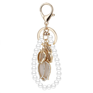 Portachiavi con ciondolo a forma di tulipano in cristallo e perle, design alla moda, per auto - Product Image 6
