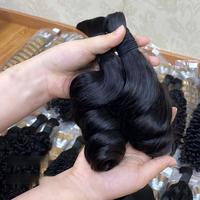 Lots de mèches de cheveux, queues de cheval, tresses, extensions de cheveux naturels, perruques complètes en provenance du Shandong, Chine, pour le commerce international