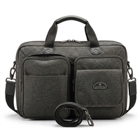 Sacoche pour ordinateur portable en tissu de coton gris foncé, style moderne, avec fermeture éclair, double poche frontale, poignée supérieure et bandoulière amovible