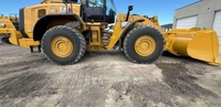 Chargeuse sur pneus CAT 980 d'occasion avec des performances puissantes, un fonctionnement fiable, une forte capacité de charge et une efficacité de travail excellente