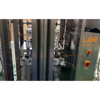 Machine d'emballage automatique de biscuits avec peseur à 14 têtes et élévateur à godets |   Machine d'emballage pour l'industrie alimentaire