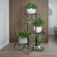Support d'angle pour pots de fleurs en métal noir à 4 couches pour pots et jardinières Application domestique