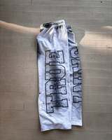 Personnalisé 100% Coton Applique Graphique Patchs Brodés Empilés Pantalon de Survêtement Évasé Strass Lavage À L'acide Jogger Pantalon Évasé