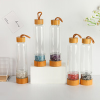 Vente en gros de bouteille d'énergie de pierres précieuses en cristal naturel tasse de pierre concassée en cristal tasse en verre tasse de corde de couverture en bambou et en bois