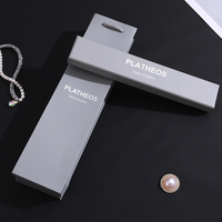 Boîte rigide sur mesure gris mat texturé avec couvercle et base, gaufrée, pour collier spécialisé en perles, coffret d'identité Héritage
