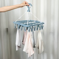 Séchoir à linge pliable en plastique, résistant au vent, robuste, gain de place, avec 32 pinces pour chaussettes et sous-vêtements d'enfants et d'adultes, rangement pour balcon