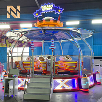 Manège de parc d'attractions Nova Rides FRP Steel Galaxy Storm à vendre, 16 places, avec système de pulvérisation BC-SK, sur remorque