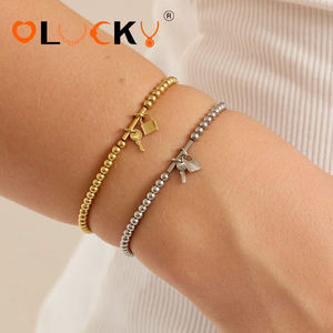 Fabricante de Joyería Personalizada LUCKYJIU, Pulsera Elástica de Acero Inoxidable con Baño de Oro de 18K, con Cierre y Dije de Llave, Venta al Por Mayor - Product Image 3