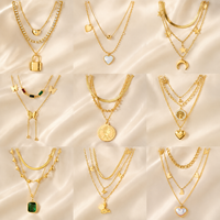 Colliers ras du cou et chaînes de mode multicouches pour femmes, en acier inoxydable personnalisé, or 18 carats, perles, pendentifs cœur et papillon