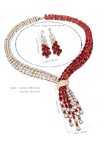 Ensemble collier et boucles d'oreilles en zircone vert émeraude, plaqué or, avec nœud croisé et franges asymétriques multi-rangs