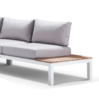 Ensemble de salle à manger rond d'extérieur en aluminium thermolaqué imitation chêne, 6 places, avec chaises et tables à coussins résistants aux taches