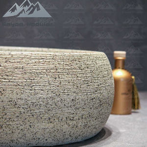 Lavabo rond sur plan en céramique texturée motif pierre Wayon pour projet hôtelier de luxe - Product Image 2