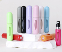 Bouteilles cylindriques en plastique d'huiles essentielles de vaporisateur de remplissage de fond de mini-portable imprimé de 5ml avec logo personnalisé pour le sous-emballage de parfum