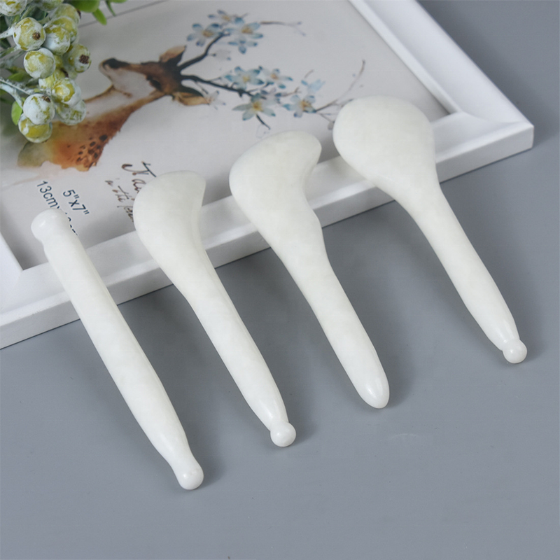 Couteau de jade blanc et tige de traction tendon