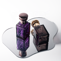 Vente chaude Bouteilles de parfum en verre coloré avec bouchons en métal Fabricant Fourniture directe Récipients de parfum personnalisables de haute qualité