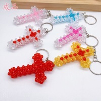 Nouveau créatif fête de mariage bijoux cadeaux perles colorées tissé coeur Rose pendentif Animal fruits croix à la main artisanat porte-clés