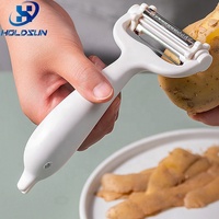 Pengupas dan Pemotong Buah Manual Putar 3 in 1 Multifungsi Desain Lumba-lumba Stainless Steel Kontrol Warna Kustom Mudah Digunakan